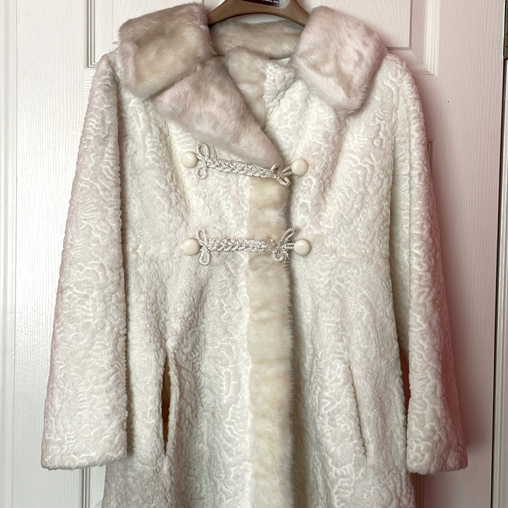 Eggshell white Borg peacoat with cream faux fur borders and braided rope accents